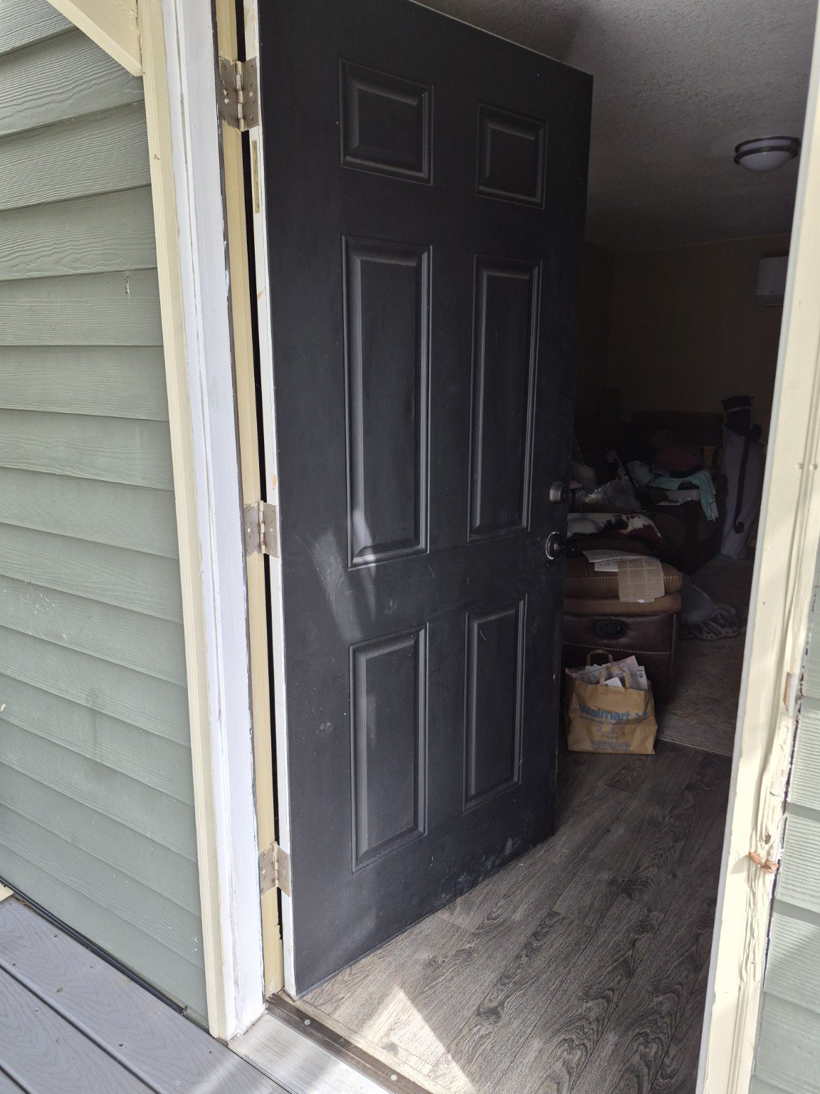 Exterior entry door before replacement