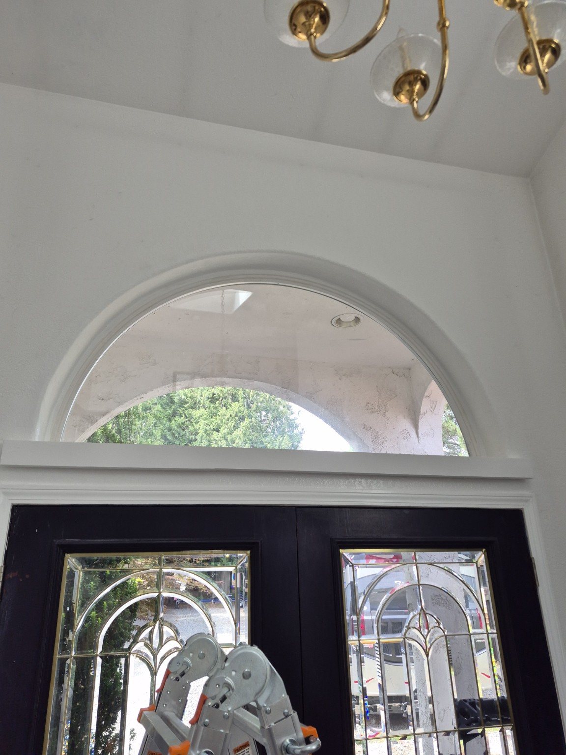 Arched transom trim after repair